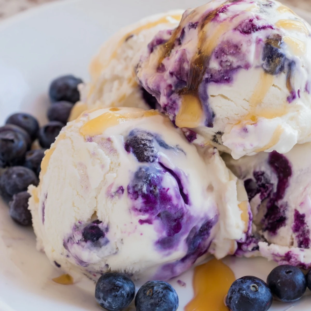 This no-churn Blueberry Cottage Cheese Ice Cream is frozen in a loaf pan, showing a smooth, light purple texture.