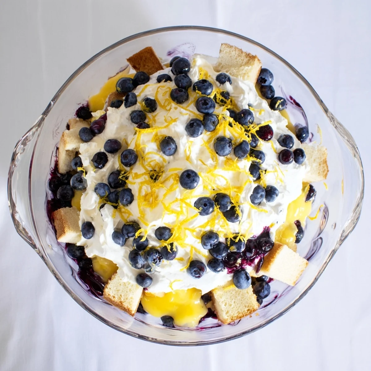 Fresh blueberries and bright lemon curd layer this easy lemon blueberry trifle dessert
