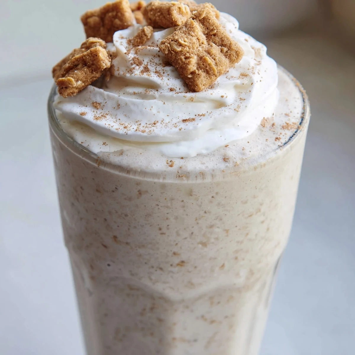 Frozen blended coffee frappe infused with cinnamon cereal and vanilla garnished with crunchy Cinnamon Toast Crunch