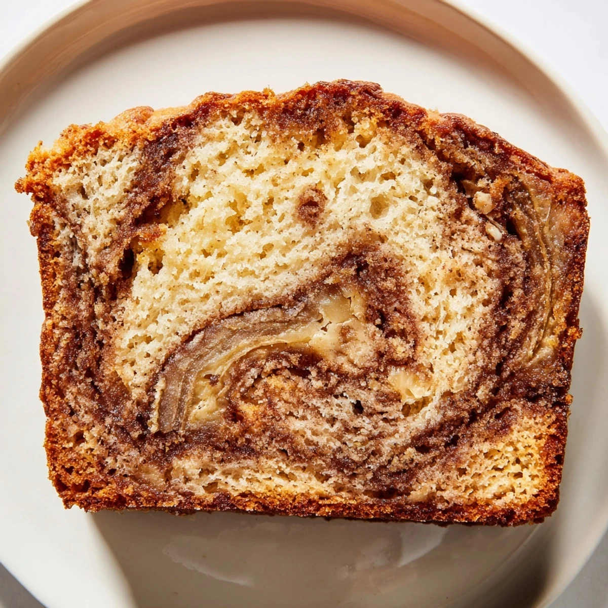 Moist Cinnamon Sugar Swirl Banana Bread with ribbons of spiced sugar throughout tender crumb