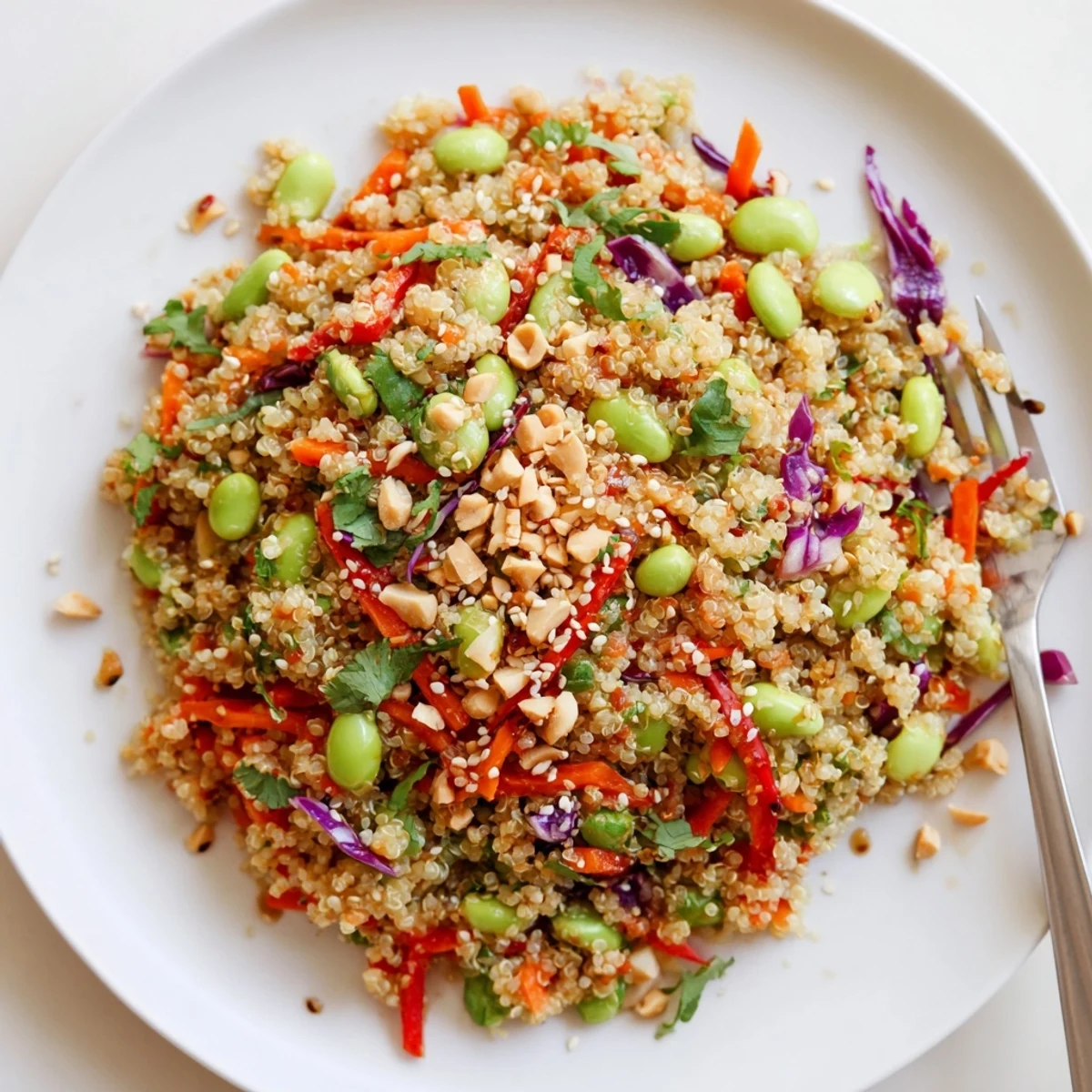 Asian Dressing Quinoa Salad with fluffy quinoa, crunchy veggies, zesty lime dressing.