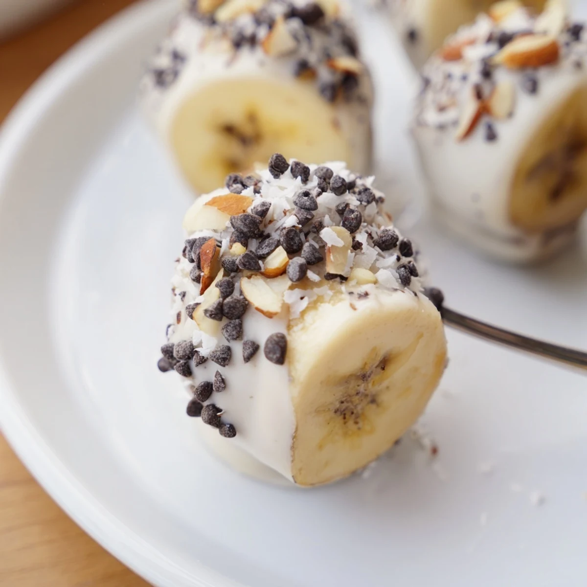 A stack of Frozen Banana Yogurt Bites, cool and tangy, perfect summer snack