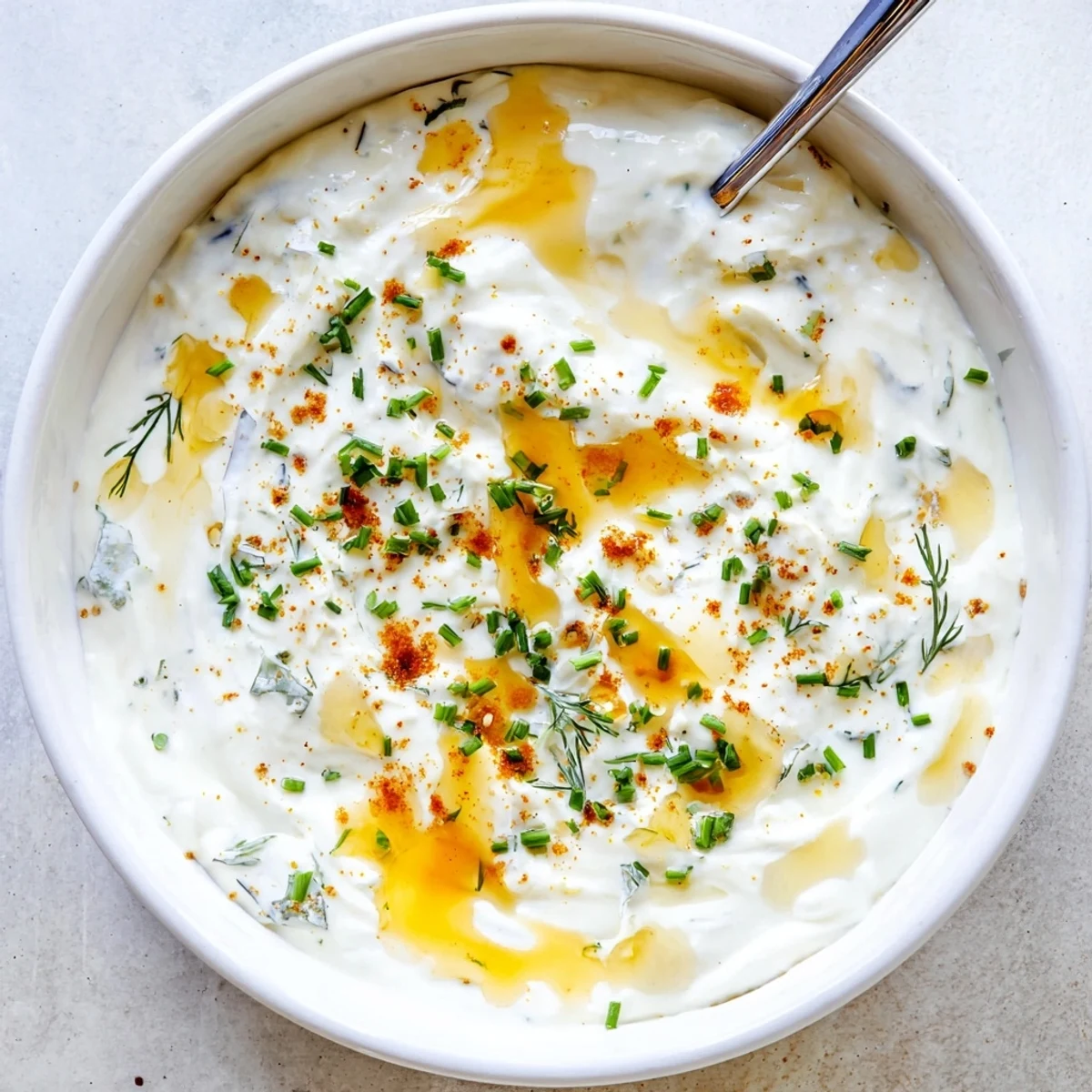 Creamy Hot Honey Ranch Dip with bright herbs, perfect for veggie platter.