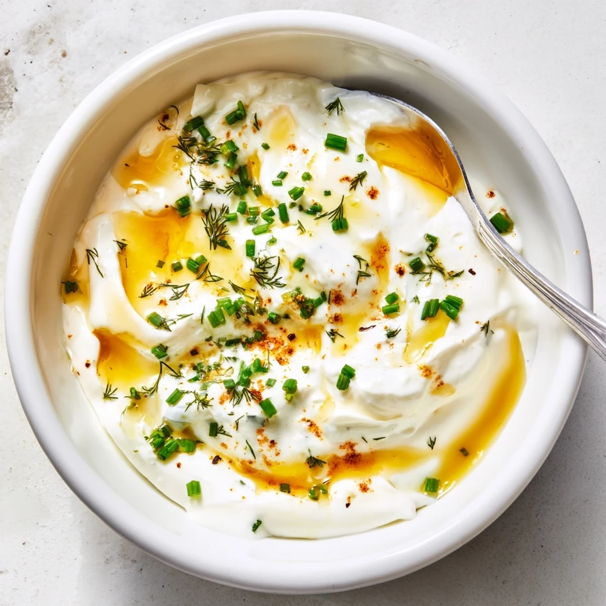 Chilled Hot Honey Ranch Dip spooned into bowl, ideal for wings.